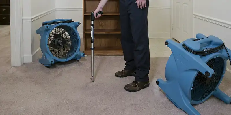 emergency water removal equipment deployed to dry a flooded residential interior in Pittsburgh, PA